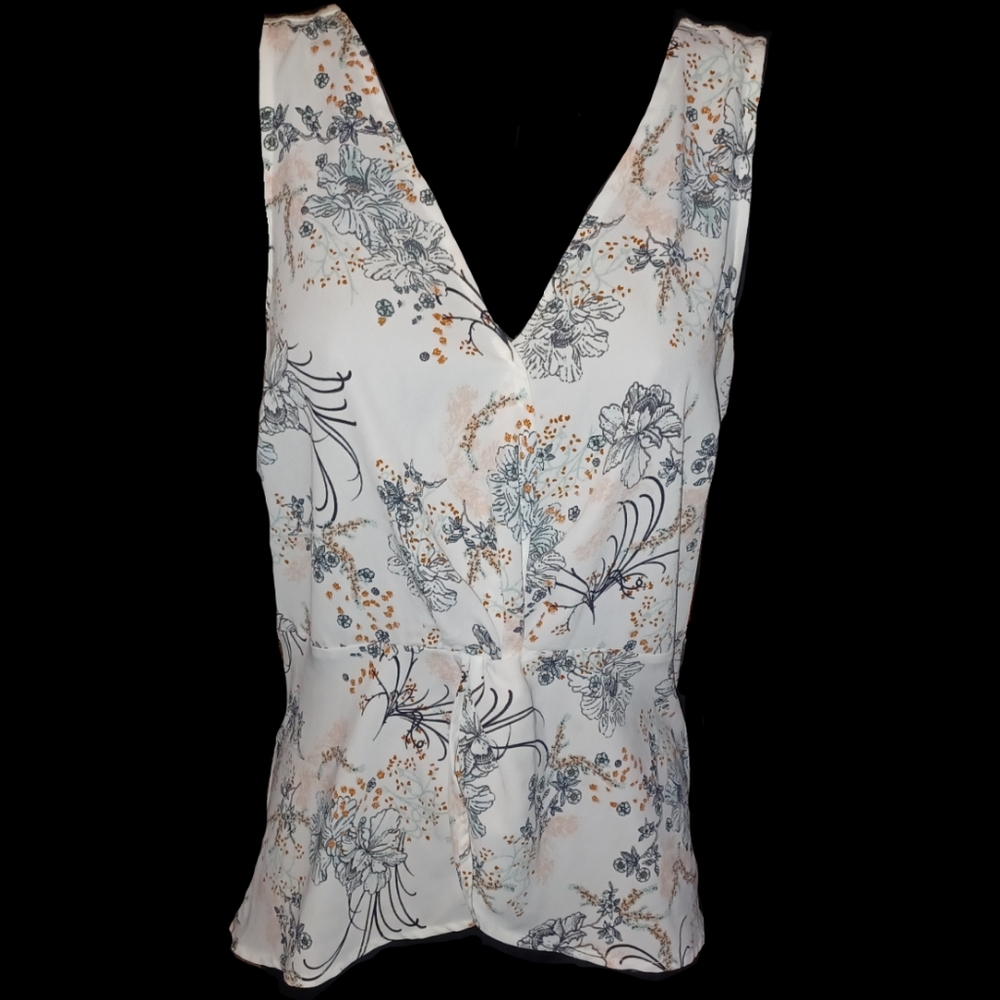 Floral Sleeveless Crossover Twist Front Top by Maurices